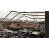 Tientallen boten verwoest door brand