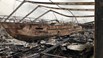 loods vol boten volledig uitgebrand